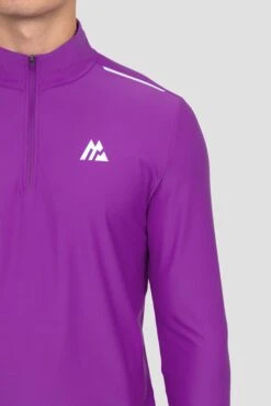 Charge 2.0 1/4 Zip - Electric Purple -Montirex CHARGE 1 4 ZIP PURPLE CACTUS FLOWER close logo