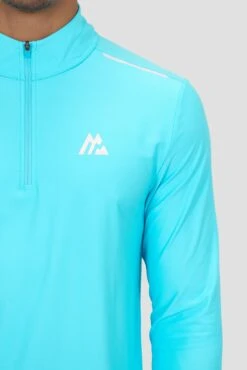 Charge 2.0 1/4 Zip - Neon Sky -Montirex CHARGE 2.0 1 4 ZIP BLUEFISH Logo Detail inc Zipv3