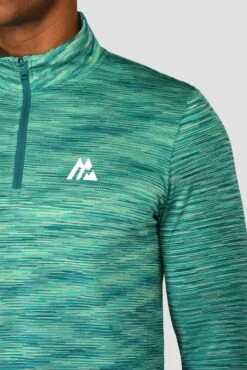 Trail Seamless 1/4 Zip - Mountain Meadow/Deep Sea -Montirex TRAIL SEAMLESS 1 4 ZIP MOUNTAIN MEADOW DEEP SEA logo detail